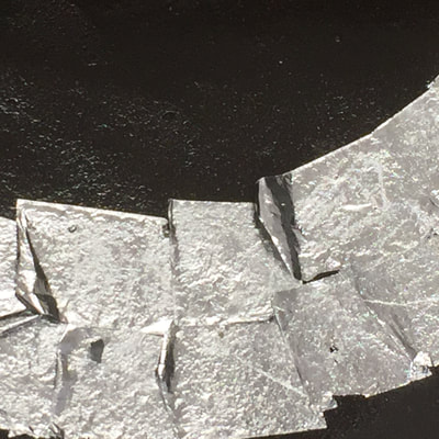 applying aluminium leaf